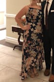 Loved this dress! The neckline is a little different and the dress is very long in the back if you are short like me, but overall was the perfect dress for a fall wedding. Like the other reviews said there is not a lot of give to the fabric, but a large fit me perfectly and I have curvier hips. However, if you are concerned or the measurements are close, I would order a size up. - Emily