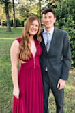 Wore this dress for a fall wedding in Charlotte. I usually wear a medium in a dress but for this one I ordered a small so the waist would fit tighter. I would say that it was true to size. My only complaint is that the color is not as pictured, it is more of a hot pink/fuchsia. Aside from that it was super comfy and fit like a glove! With my height I didn't have to wear heels and it perfectly touched the ground. Overall I loved it! - Alexa P.