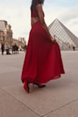 This dress is beautiful and elegant. Great material, very well made. Fits perfectly! I'm very tall and it was long enough!! - Jovani F.