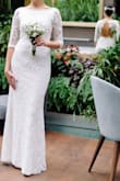 This dress was perfect for my elopement. The only thing that I updated was changing the round neckline to boat neckline and adding a thin 2mm rhinestone chain along the neckline and  waist. I got so many compliments on this dress. The picture shows front and back in the mirror. - Anna L.