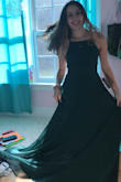I loved the dress, the color was as bright as it was in person! The size of the dress fit me perfectly and I only had to hem it on the bottom because I'm short! But overall I had no concerns or problems! - Ella S.