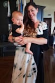 This material has no stretch, but is nice and light for sweltering California weather. The modesty snap is great, especially for a mom who wants to dress up, but doesn't want to look too revealing. - Brittany Z.