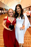 I had to get it shortened, but it fit amazingly. I wore it to a gala. - Elisha B.