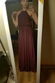 Finally! A dress that's actually plum! I've been on a never ending hunt for a true plum color and sent back so many dresses from other online stores that arrived barney purple. This color was perfect!!! The waistband was a little tight (it did stretch, but I was close to its limit) but hit perfectly at the center of my waste. If you're on the edge between small and medium, I would order the medium. The dress is also very long so you may have to hem. The neckline is adjustable by tightening the strings in the back, which is nice. The top was flowy and I would feel confident in this dress either not wearing a bra or applying tape/pasties. Quality material and not see-through. 10/10 would recommend! - Allison O.