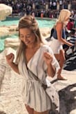 I love this romper and it fits perfectly, but it is short if that's not something you like. I wore this traveling and it was my favorite item to wear the whole time. - Aja S.