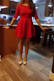 I was shocked at how beautifully this dress lays on me. One of my favorite dresses ever! The red is such an exciting bright color! The trim on the top of the dress is what makes it different and unique. Bought it for a wedding, can not wait to wear it! Also, perfect length! - Magdalena W.