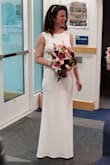Once I tried this on I knew it would be my wedding dress. It was sleek and comfortable, showed off my curves without being overly sexy, and I didn't have to buy a special bra. The fabric has a slight stretch which I like. The back drape I needed someone to help me with, but that and the touch of lace added just enough detail for my taste. Got tons of compliments. - Katie T.