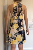This dress wasn't what I expected. It falls about to my knee, the material is thin and sheer looking, and it's far too big. I would not order this dress. I normally have great luck with Lulu's brand but this dress was disappointing. The colors are pretty though. - Courtney R.