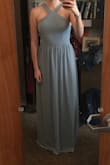 I love the dress! It's beautiful fabric and doesn't cling. A bit long, but that's fixable. I ordered a medium, and it does run small. The medium fits just right for me, and I usually wear a small. Overall though, beautiful dress. - LAUREN U.