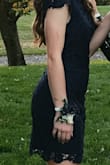 The dress was perfect except the lace was a little loose at the back of my shoulders. I just used some double-sided tape to keep it down. It was a fabulous dress for homecoming! - Elizabeth Y.