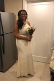 I wore this for my courthouse wedding and Got so many compliments! I added a rhinestone bridal belt and it was perfect! It's pretty long, but when I put on my heels it didn't drag or anything. Loved it! - Diamond H.