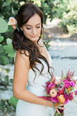 This dress is absolutely gorgeous. I ordered it as a backup for my Florida wedding in October and ended up loving this dress more than any of the others that I tried on. It is flattering, intricately beaded, and beautifully made. It hugged my curves in all of the right places and made me feel like such a beautiful bride. If you are looking for a dress for your beach wedding or any other event, I highly recommend this dress. There was a small train in the back, which was perfect -- no alterations needed! - Luci C.