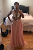 This dress is lovely, especially for the price! Unfortunately the top part was too big for me and the straps kept falling off. I would've altered it but needed it sooner than later. It was super flattering though and made me feel thin since I have a heavy mid section. - Avni R.