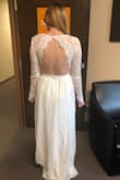 I'm wearing this dress as a wedding dress for my November wedding. It's absolutely beautiful. I'm a small chested woman (thanks to my kids) so it's very big in the torso area without a bra, but I found a backless strapless push-up bra from target that filled out the dress beautifully. And it hides my god awful tattoo I got years ago. - Rebecca H.