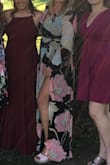 I really liked this dress and I am not a long dress person. Bought it for a wedding I was attending. Bought a Medium (normally wear a M) at first but it was a little tight in the back/bust and felt it might rip so I sized up to a Large. The Large was really big but with some extra pins it felt a little more secure. I also added a pin to the bust to make it less revealing. I really liked the dress so I will be getting it tailored and be wearing it to another wedding. It was very comfy and easy to wear all night. Perfect length for me. Love the slit. You can see in my picture that the section that should be tight under the bust was pretty lose even with all the pins. But still loved the dress! - Taylor B.