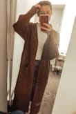 There were no smalls left, but I went with my normal size either way and the reviews mentioned it ran big BUT I am almost 6ft so I thought maybe my shoulders would fill it out better but it still was quite large. Super cozy, cute and the color is def a brown shade which I was not CRAZY about. I thought it would have a bit more burgundy in it! - Julianne F.