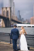 I bought this for my September elopement and I'm so happy I did. It photographed so nicely! I'm on the busty side and I was amazed to find I didn't need a bra (you couldn't really wear one if you wanted to), the sewn in cups actually worked well for me. It fit well, and looked great, would definitely recommend! - Nora T.