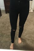 I've been looking for a pair of high-waisted black jeans with a little distressing for a long time and I'm so glad I finally found these! I was worried about the sizing because I usually wear a size 4 or 27, but I'm glad I went with the 3. They are a little snug going on but are perfect after wearing even for 30 minutes. My only negative is that there is NO belt loop!!! So sad! - Savanna M.