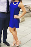 I love this dress. It is short (and I am short, so that is saying something) and cute and flirty. It is loose, so I felt comfortable wearing it to a work event and to a wedding. It is fitted enough that it does not feel like a sack dress. Only negative is it wrinkles pretty easily - so watch out for the seat belt! - Vanessa C.