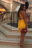 This romper is really cute and great quality. But, it is also very short. I wore the to brunch on a bachelorette party, so I felt comfortable even with the length. But it is not something I would wear to a family event. I'm 5,2 and have a slightly long torso. - Jaclyn L.