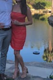 I love this dress but wish it fit a little differently. It hangs a little lower in the front than in the back and I wish it was a little tighter. There are some pictures from the wedding I attended where it just looks weird if I'm not standing perfectly. - Julia M.