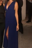 The upper part of the dress I had to get tailored to fit more snug. Otherwise length was perfect with heels. The drapery is heavy in the dress which makes it look elegant and not cheap. - Andrea S.