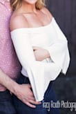 This bodysuit is so adorable!! I wore it for my engagement photos and it fit like a glove! I thought it looked more white than off white which is what I wanted. I got so many compliments and people loved the sleeves!! - Nicole W.
