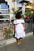 It runs a little large but it is a very nice vacation dress. I got so many compliments. - Yawa D.