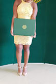 I wore this dress to my med school graduation and it was so comfortable. It didn't ride up at all and received many compliments on it. I'm usually a size 6 in dresses and the medium fit perfectly. It was just the right length as well. - Brittni R.