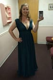 I bought this dress for a friend's wedding and loved it from the moment I tried it on. The color, material, and design are fantastic. I'm short and squat so I expected the dress to be too long and had to get it tailored for length. The only thing that I wasn't expecting to not fit was the shoulders - they were a little too long so I had them tailored about an inch shorter. Small fixes and absolutely, 100% worth it. It is low cut and even though I danced all night I never once worried about having a wardrobe malfunction and in fact didn't have any! I received countless compliments on this dress and intend on wearing it again for other fancy events. 10/10 recommend to anyone looking for a quality wedding guest dress! - Sabrina B.