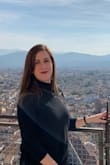 I bought this top to wear around Italy and it was so comfortable. Looks great with loafers and boots. The material is not very thick but it did the trick to keep me comfortable on mildly chilly days. - Elizabeth R.