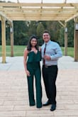 Wore this jumpsuit to a cocktail attire wedding and it was by far the best outfit I've ever bought from lulus. I received so many compliments on the color and the fit. The jumpsuit fits true to size- I am always a medium so this fit just right. I normally always have a hard time wearing strapless because I'm not as busty to hold it up, but there is an elastic on the inside that snugs it to your chest to make it fit perfectly no matter what your bra size. I would definitely recommend getting it hemmed a bit on the bottom. I didn't have time to do so, and I am 5'5 wore 3 inch heels and it still covered my feet completely (but not so much that I was going to trip and fall!) Hugged all the right places and was definitely a showstopper- makes me want it in all the other colors too! - Victoria W.