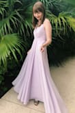 This dress is so beautiful in person! I wore it to a wedding, and I received so many compliments. I usually wear a small, but I ordered an extra small and it fit perfectly. Since I am pretty tall, 2 inch heels worked for this dress, but if you're shorter you will definitely need taller heels. Would recommend to others! - Caitlyn R.