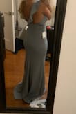 I ordered this as a bridesmaids dress and the fit is Sexy and clings to all the right places. The material is thick and expensive. It needs to be hemmed but otherwise amazing. - Jona C.