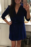 Wore this for an engagement party and loved it. The neckline is very low so I used a safety pin to keep it from gaping open. The medium fit well and I felt comfortable in it. I probably also could have done a small because there was a bit of extra fabric around the waist and arms were a little loose but I didn't want it to be too short. A fun dress! - Jennifer F.