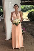 Beautiful dress with good quality. I was skeptical that the dress would look cheaply made, but it definitely didn't! I received so many compliments on it! It's a little blush, but also has some peach tint to it. - Carolina A.