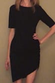 Ordered a medium for length. The dress appears more asymmetrical after washing but still cute! - Kathleen C.