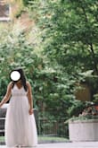 Wore this dress for my engagement pictures. Loved the dress. Fit was a bit smaller than I would've liked. Tight around the rib cage. I also noticed that the dress didn't photograph well. You can see a shadow of my legs. I will buy from Lulu's again as the pricing is very reasonable. - Daniella R.