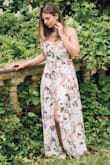 I wore this dress for our engagement photos. It it so flattering. Fits true To size. I ended up wearing a strapless bra and fashion taped the back down so you couldn't see it. - Lana B.