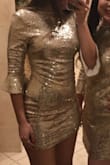 I seriously love this dress! It's the perfect shade of gold and it's comfortable. it is breathable, unlike many sequin type of dresses. if this dress catches your eye, go for it:) I loved it - Kaylee G.