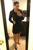 This jacket is super cute. It really looks and feels like leather. It runs small so I'd definitely size up. I usually wear a medium in tops and ordered a large. It's actually still tight through the shoulders and arms but it's comfortable enough I don't have any issues. It's also a little more cropped than I expected. I have a long torso so I'm sure that's part of it. Overall I love the jacket! - Kayti M.