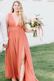 I LOVE Lulus dresses, but because I'm a bit curvier, I always order the large size. This was SLIGHTLY larger than other dresses I've gotten from them, but not enough to want to downsize. I ordered this with my engagement photos in mind, and was so happy with it, I'll be using the same dress in a different color for my bridesmaid's dresses! - Samantha M.