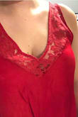 I really wanted to love this top but the fit was too weird on me. The portion of material where the lace meets the satin is tight across my chest and the lace around my armpits is loose and the material bunches. When I put it on I had to play with it a lot, and to make it 'sit right' on my chest the front of the shirt is pulled much higher than the back, almost making it a crop top length. The material itself is so nice and the color is beautiful, it just didn't fit me well at all. Might be better for girls with smaller busts. - Em K.