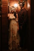 This dress was amazing for my husband's and my masquerade rehearsal dinner! I got SO MANY COMPLIMENTS! It may have outshined my wedding dress! ;P It is very elegant, yet soft and romantic. The material is light and comfortable the peek-a-boo style sleeves add the perfect touch. I highly recommend this dress! - Margaret V.