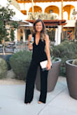 This jumpsuit is perfect if you're going somewhere warm but want to be seasonally appropriate! I wore this is Palm Spring to a cocktail event.
I have a long torso and am on the taller side so the body of the jumpsuit was a touch short for me but not a deal breaker! Length of legs was great and I was able to wear heels. - Lindsay C.