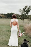 Dress fits perfectly! Love the details! I plan to wear this as my wedding dress because I'm having a small wedding and don't want to spend the money on an actual wedding dress. Very satisfied! - Ann D.