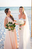 I chose this dress for my bridesmaids. The color is not blush pink, it is peach. I had a beach wedding and the peach was perfect against the blue ocean. The material is jersey knit and does wrinkle when traveling. My bridesmaids were able to choose how they preferred to tie the dress. It worked out great! I actually ordered multiple colors to decide. Lulus is so great with the free return policy. This allowed me to truly decide what color I wanted in my wedding. - Christina B.