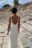 Gorgeous and classy. Worth its price. Quite long and tight. Perfect with some tan. Not see-through. - Elmira D.