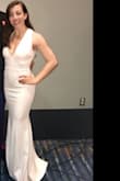 This was was exactly what I was looking for for a formal party. It was slimming, sexy, and still classy. I am usually a size small, and it fit perfectly. I am 5'5'', so it was a little too long, but could still walk around easily in it. Got many compliments all night. A beautiful dress with an amazing fit. - Christine G.