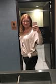 Love this sweater!! Wear it over jeans, leggings or leather pants. I sometimes leave it loose and sometimes tie it on the side. It's a little baggy but in a good way. The sleeves are more fitted so it looks tailored. Very flattering! - Angie Z.